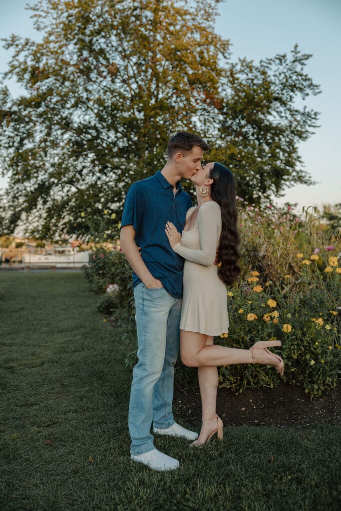 Couple posing for engagement photos at Prescott Park in Portsmouth, NH.