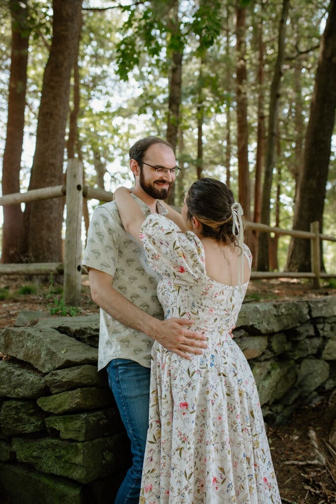 Couple posing for engagement photos at Goddard Memorial State Park